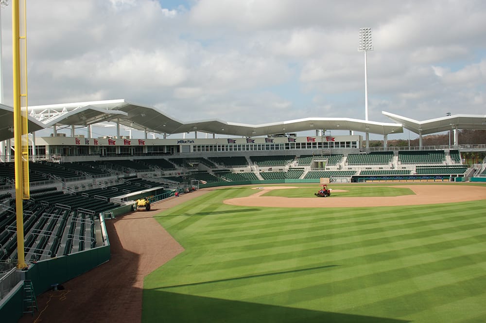 Maintenance getting a Major League Baseball field ready for a game