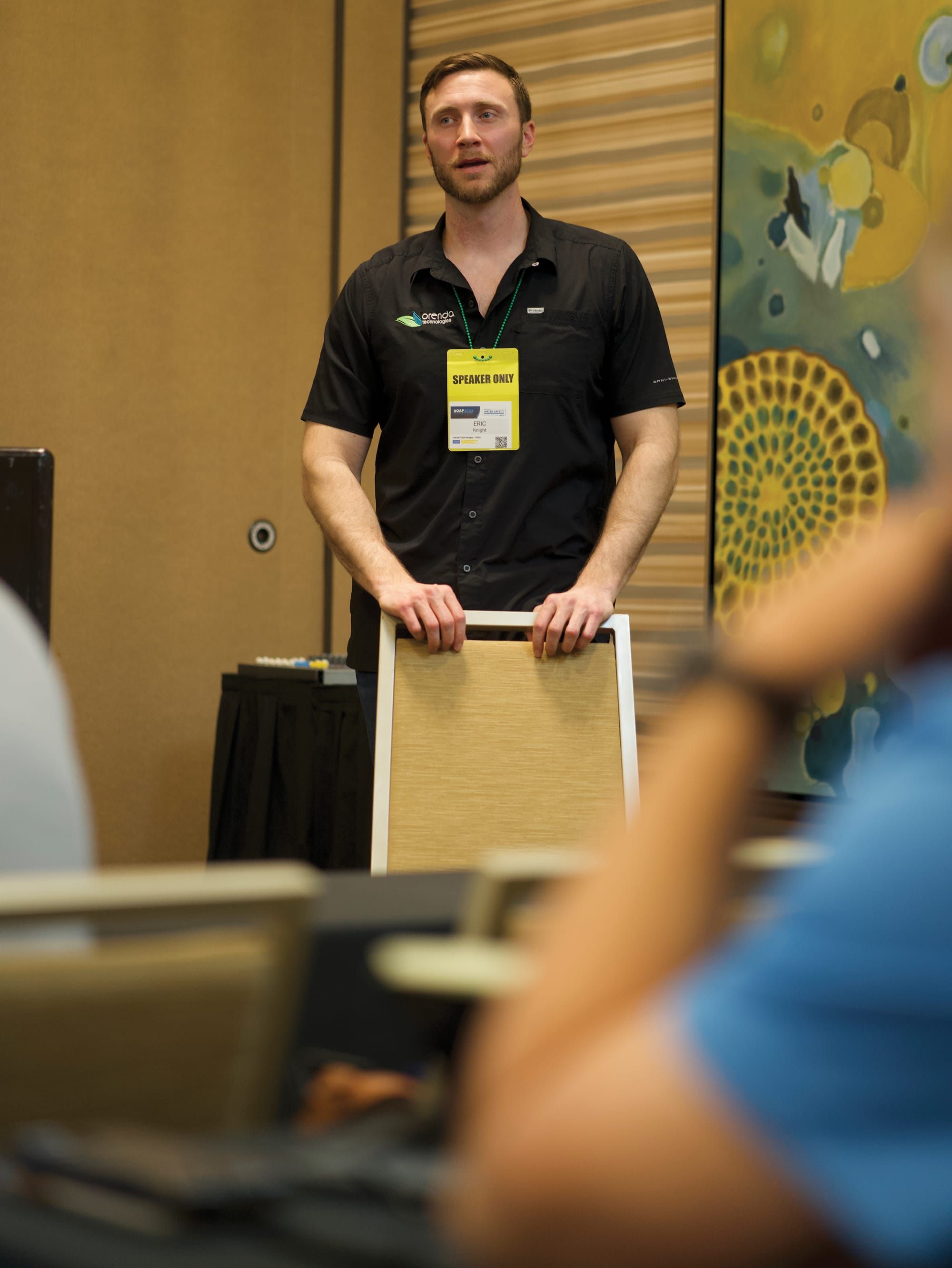 A speaker at a conference