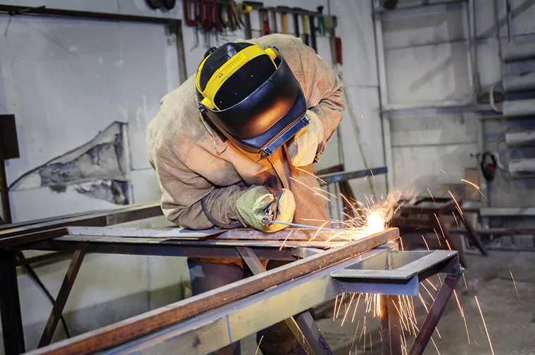 A man welding.