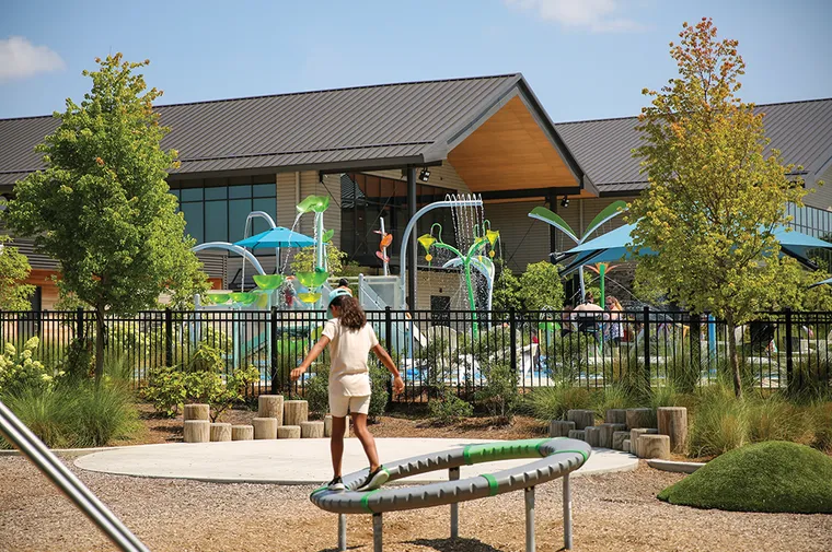 Girl playing on playgrounde.